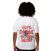 A person with curly hair, seen from behind, wears the BEAT THE ODDS S/S TEE WHITE featuring bold red and black “BEAT THE ODDS BY ANY MEANS” text over a barbed wire celestial graphic—ideal streetwear for those with cosmic flair.