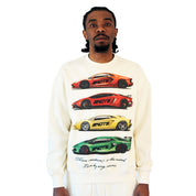 A man models the CAUTION TO THE WIND CREWNECK SWEATSHIRT CREME, featuring graphic prints of three supercars in red, yellow, and green with text beneath, standing against a plain white background.