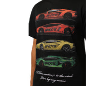 The CAUTION TO THE WIND S/S TEE BLACK is an oversized black T-shirt with puff-printed red, orange, yellow, and green sports cars stacked horizontally. "Throw caution to the wind. Live by any means." appears in white cursive at the bottom.