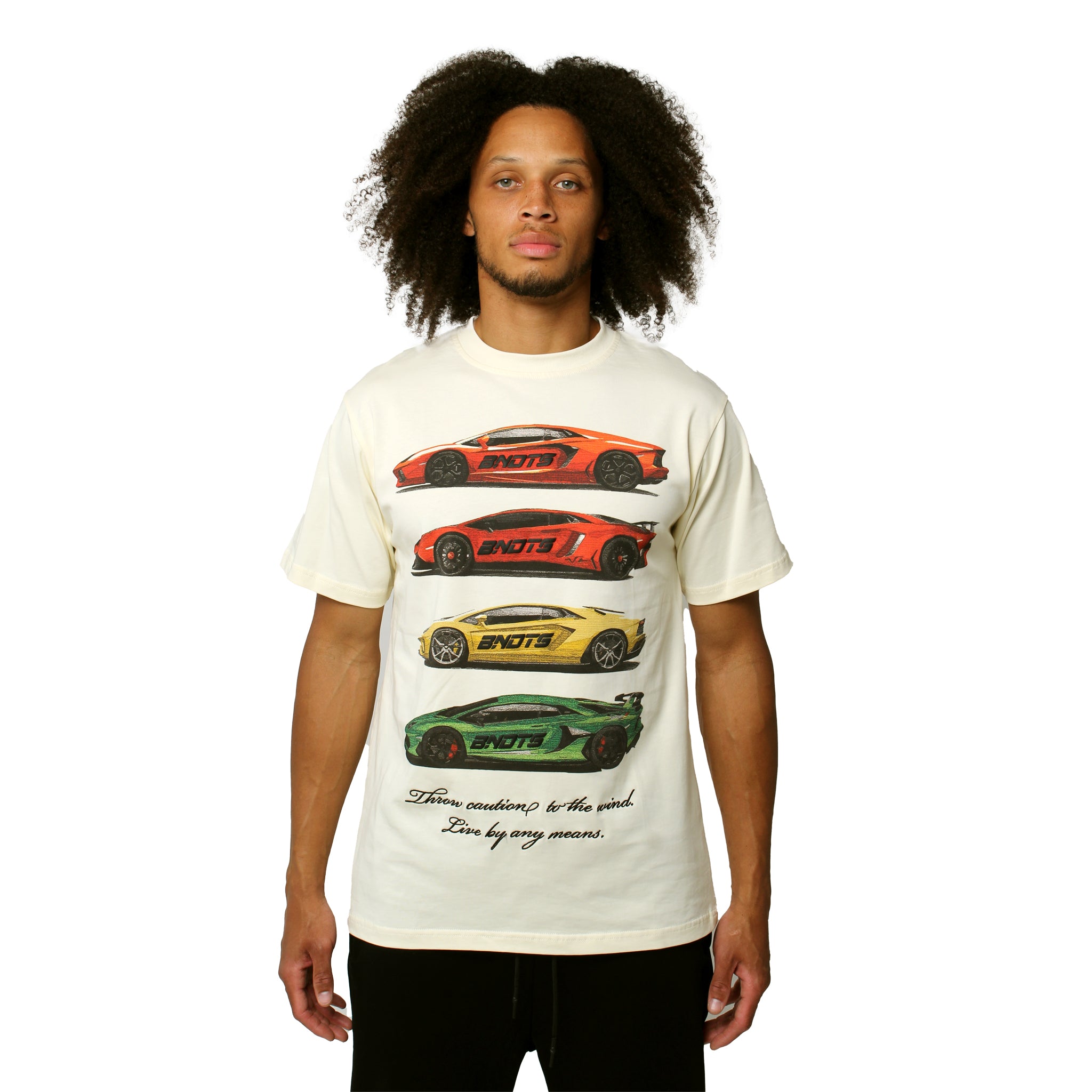 S TEE CREME, a bold cream graphic t-shirt featuring three vertically stacked supercars in orange, yellow, and green, with the text: Three winners to the podium. Win by any means.