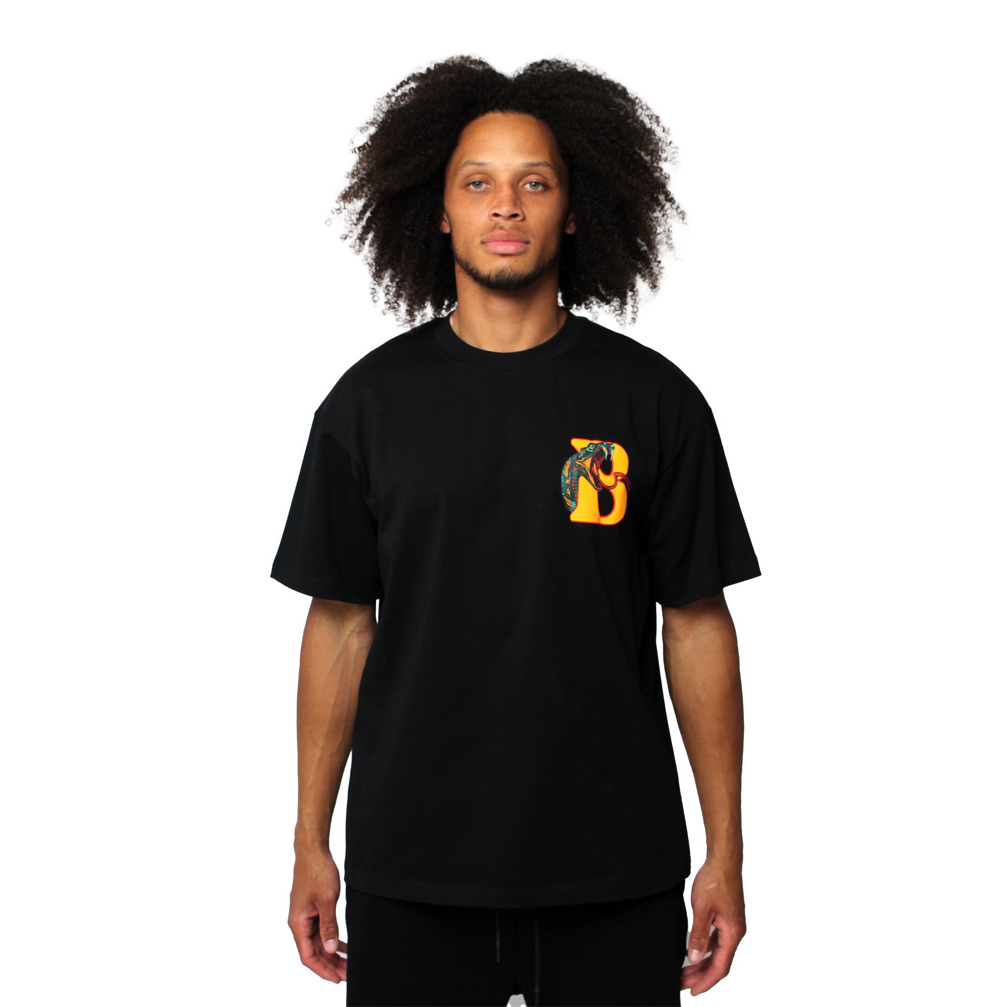 S TEE in black, which features a colorful embroidered letter B on the upper left chest.