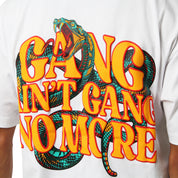 The GANG AIN'T GANG NO MORE S/S TEE WHITE is an oversized, heavy GSM cotton tee with a colorful snake and bold yellow-orange puff print text for standout comfort and style.