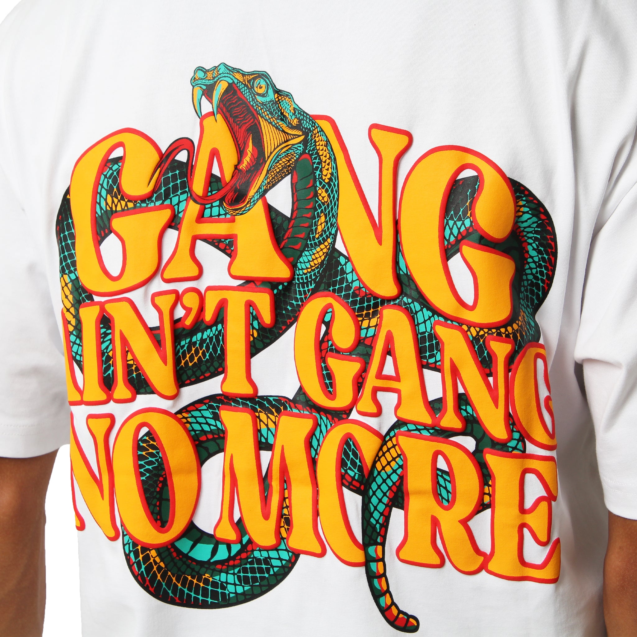 S TEE WHITE is an oversized, heavy GSM cotton tee with a colorful snake and bold yellow-orange puff print text for standout comfort and style.