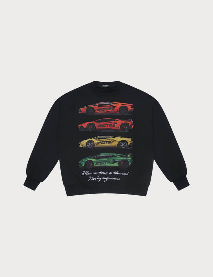 The CAUTION TO THE WIND CREWNECK SWEATSHIRT BLACK features four vibrant supercars stacked horizontally and a white cursive quote: From curiosity to the will. Live by any means. Ideal embroidered streetwear for car enthusiasts.