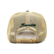 ONLY THE STRONG SURVIVE TRUCKER hat in beige mesh, shown from the back with an adjustable snapback and green 3D embroidery above the opening.