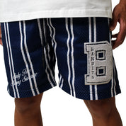 Wearing ONLY THE STRONG SURVIVE MESH SHORTS NAVY, which feature navy and white stripes, a double-layered mesh design, a large chenille “BANDITS” patch, and cursive “Only The Strong Survive” text on the left leg. Fit is true to size.